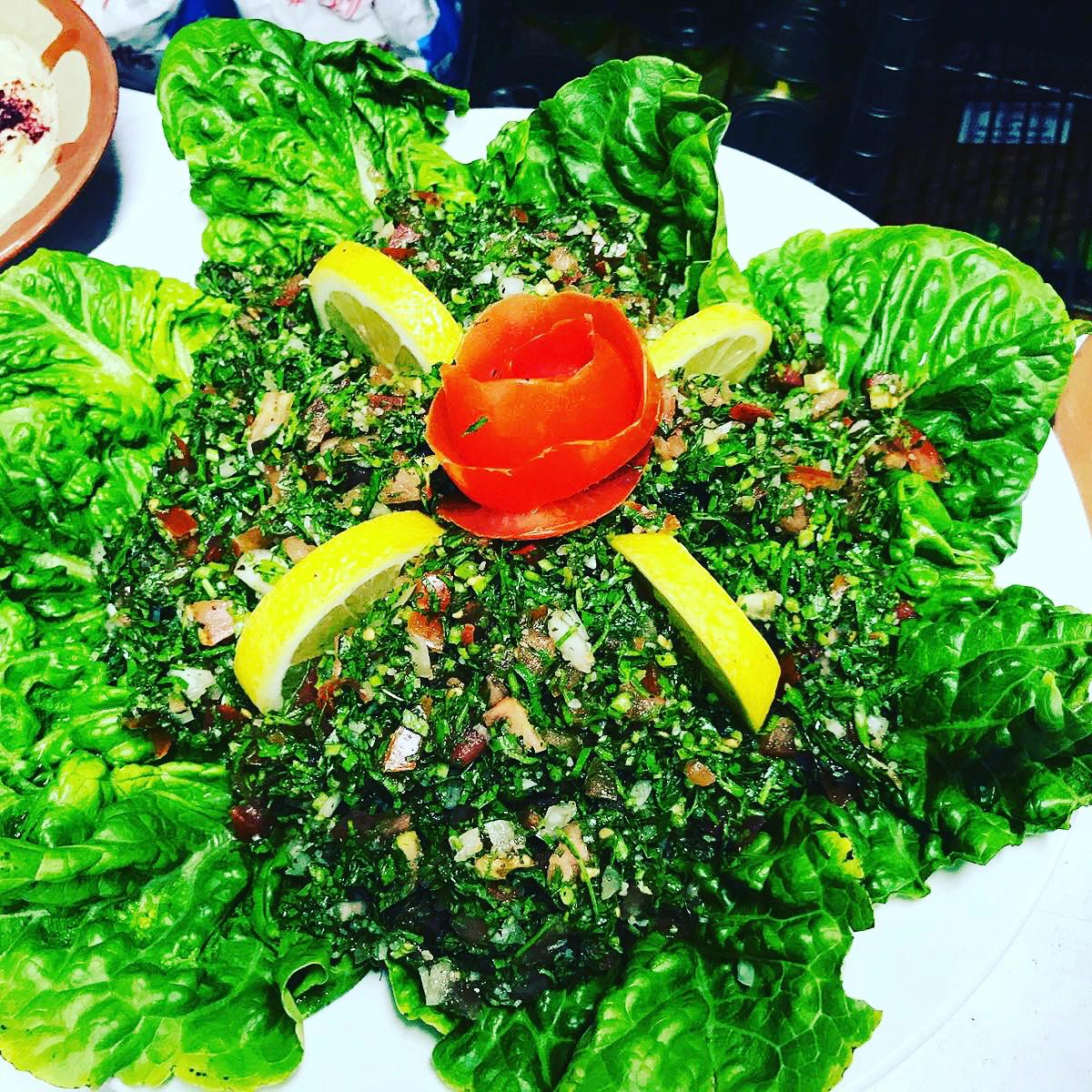 Tabbouleh served with lettuce and lemon