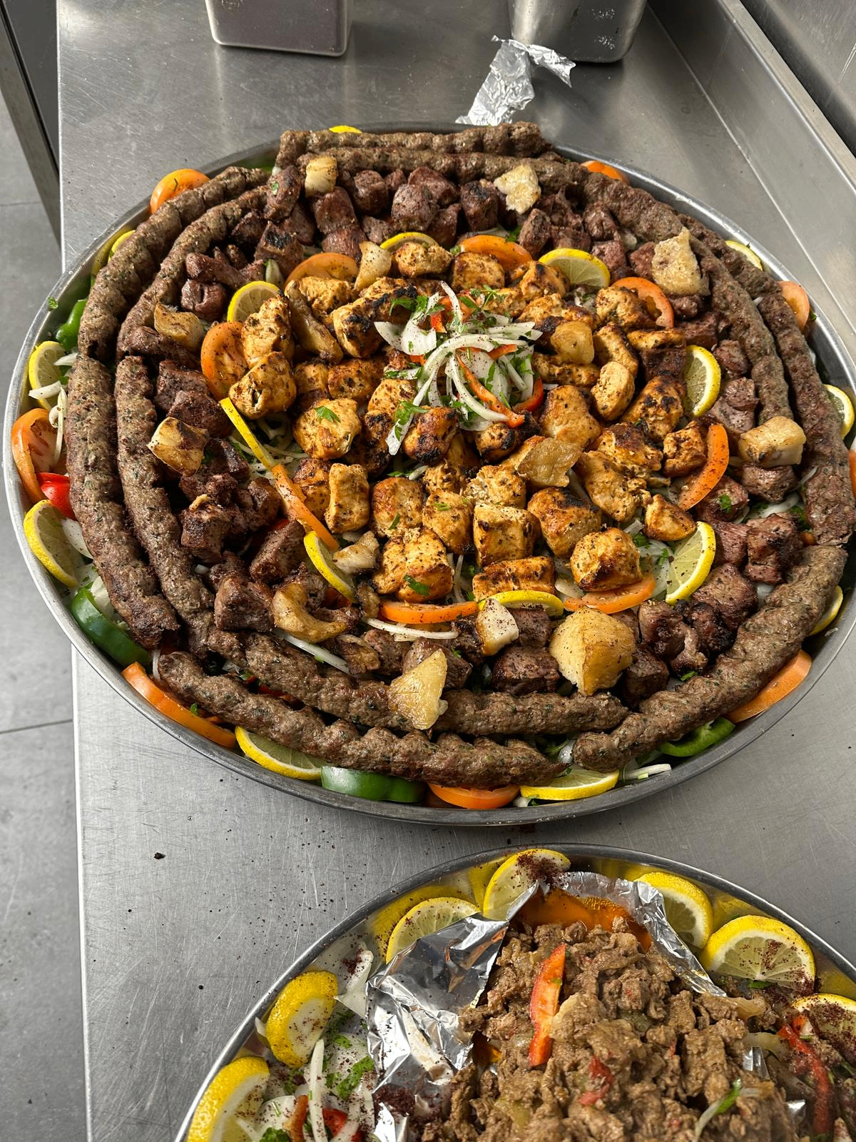 Large mixed grill platter with kofta, shish taouk and lahem meshwe